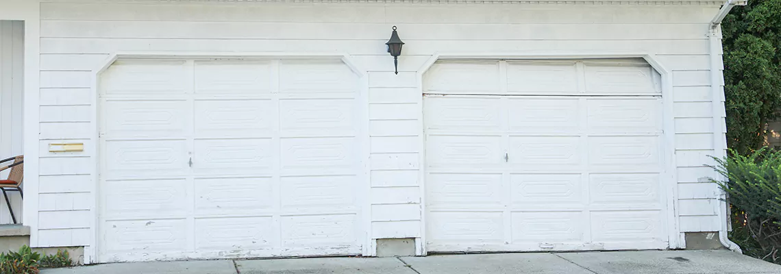 Roller Garage Door Dropped Down Replacement in Gainesville